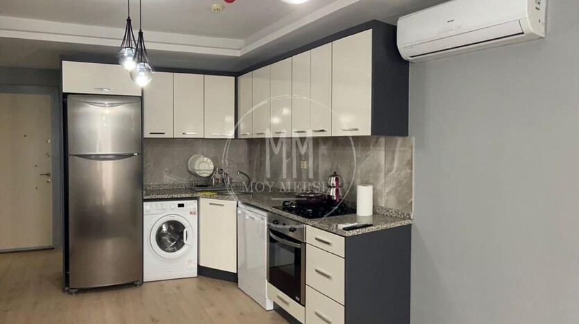 Квартира 1+1 с мебелью и техникой, район Томюк Мерсин.