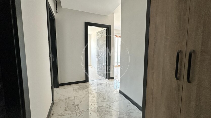 Квартира 2+1 от инвестора в районе Тедже в 350 метрах от моря.