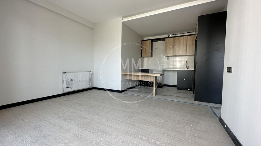 Квартира 2+1 от инвестора в районе Тедже в 350 метрах от моря.