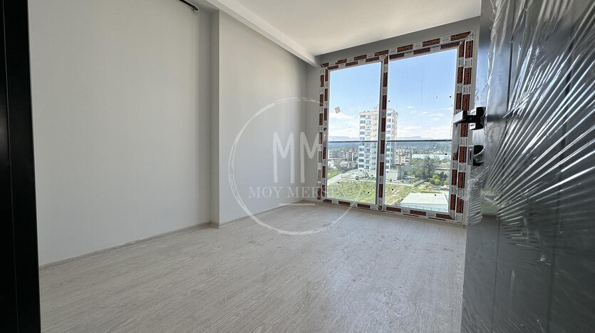 Квартира 2+1 от инвестора в районе Тедже в 350 метрах от моря.