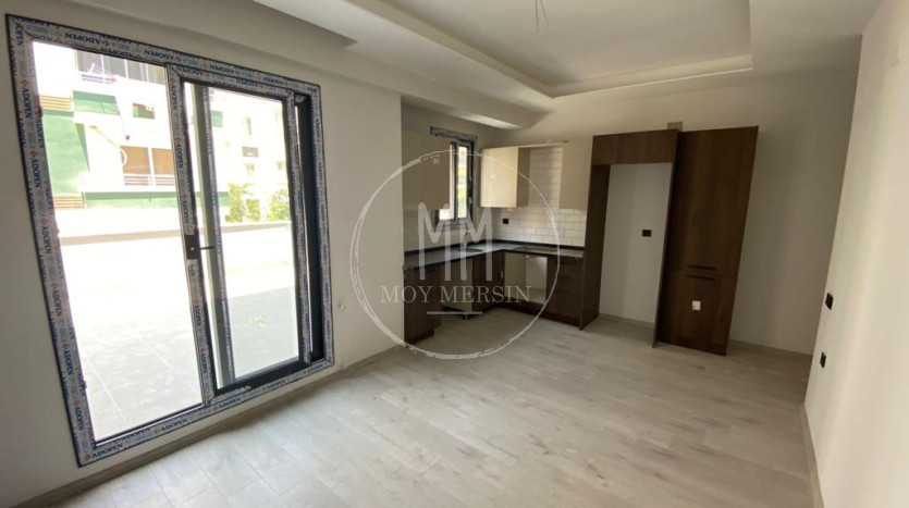 Квартира 2+1 с террасой на 1ом этаже в Тедже Мерсин