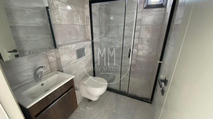 Квартира 2+1 с террасой на 1ом этаже в Тедже Мерсин