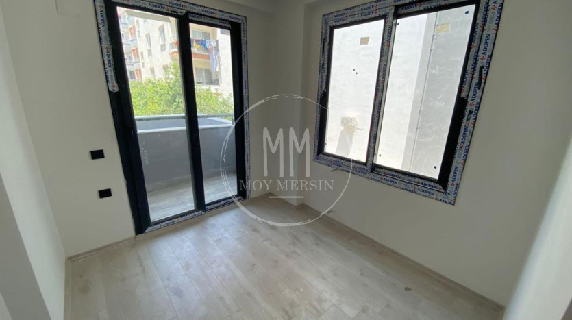 Квартира 2+1 с террасой на 1ом этаже в Тедже Мерсин