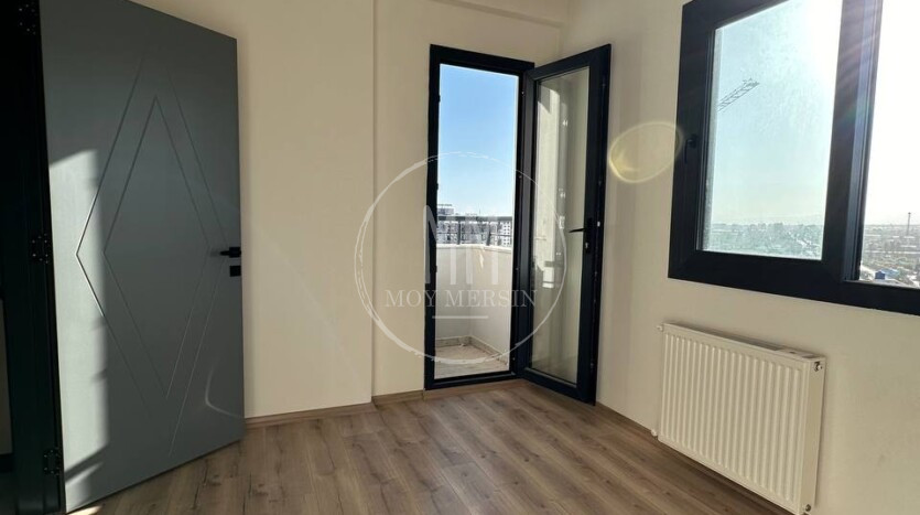 Квартира 1+1 на 12 этаже в районе Тедже Мерсин